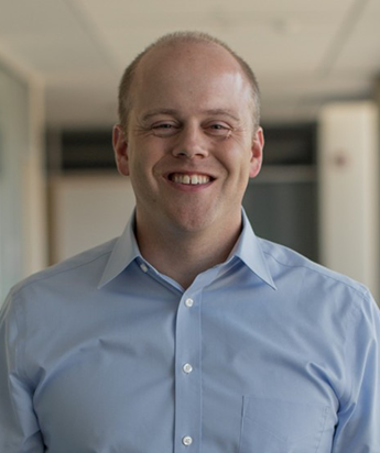 Headshot of Darin smiling